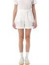 Sporty And Rich Crest Elastic Waistband Shorts Side Pockets In White
