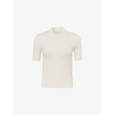 Sporty And Rich Ribbed Short-sleeve Stretch-knit Polo Shirt In Cream