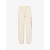 Sporty And Rich Womens Cream Ny Health Club Text-print Cotton-jersey Jogging Bottoms In Cream