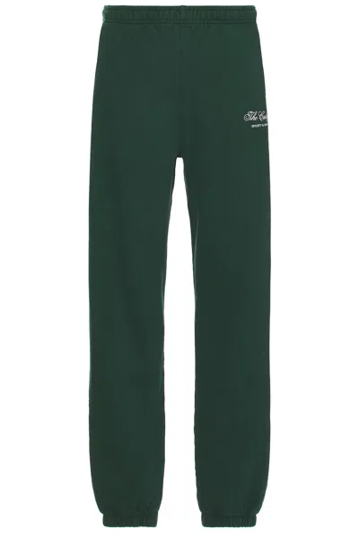 Sporty And Rich X Hotel Carlyle Script Embroidered Sweatpant In Forest