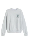 Sporty And Rich Sporty & Rich X The Carlyle Crest Logo Cotton Blend Crewneck Sweatshirt In Heather Gray