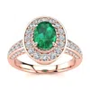 SSELECTS 1 1/2 CARAT OVAL SHAPE EMERALD AND HALO DIAMOND RING IN 14 KARAT ROSE GOLD