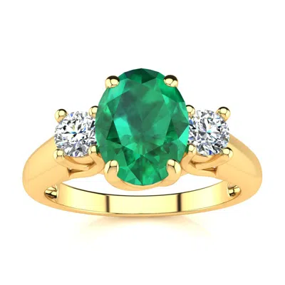 Sselects 1 1/3 Carat Oval Shape Emerald And Two Diamond Ring In 14 Karat Yellow Gold