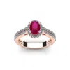 SSELECTS 1 1/3 CARAT OVAL SHAPE RUBY AND HALO DIAMOND RING IN 14 KARAT ROSE GOLD