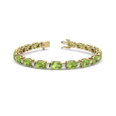 Sselects 10 Carat Oval Shape Peridot And Diamond Bracelet In 14 Karat Yellow Gold In Green