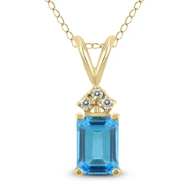Sselects 14k 6x4mm Emerald Shaped Topaz And Three Stone Diamond Pendant In Blue