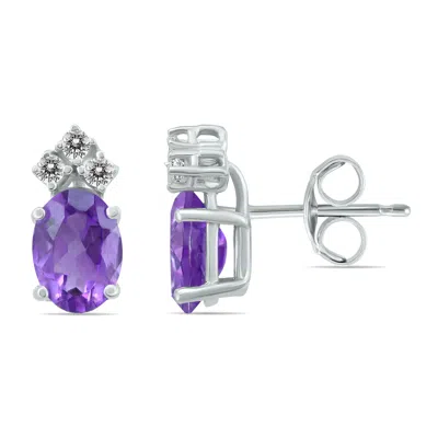 Sselects 14k 6x4mm Oval Amethyst And Three Stone Diamond Earrings In Purple