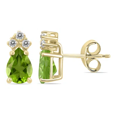 Sselects 14k 6x4mm Pear Peridot And Three Stone Diamond Earrings In Green