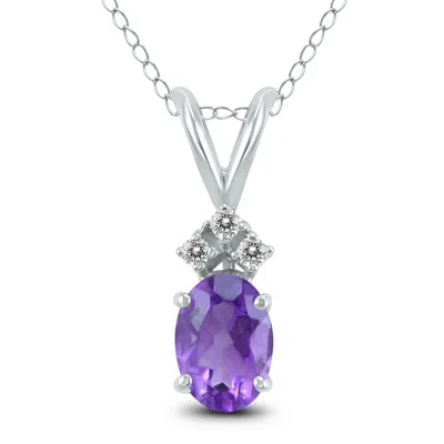 Sselects 14k 7x5mm Oval Amethyst And Three Stone Diamond Pendant In Purple