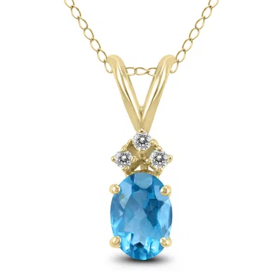 Sselects 14k 7x5mm Oval Topaz And Three Stone Diamond Pendant In Blue