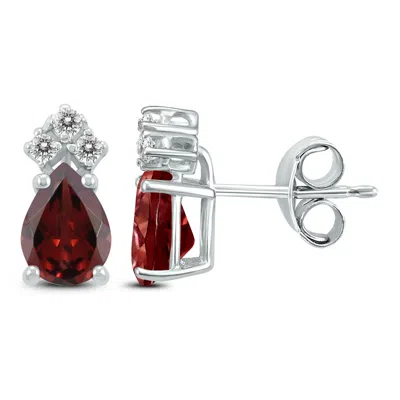 Sselects 14k 7x5mm Pear Garnet And Three Stone Diamond Earrings In Red