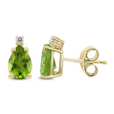 Sselects 14k 7x5mm Pear Peridot And Diamond Earrings In Green
