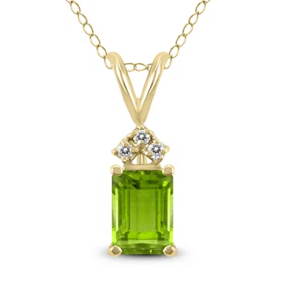 Sselects 14k 8x6mm Emerald Shaped Peridot And Three Stone Diamond Pendant In Green
