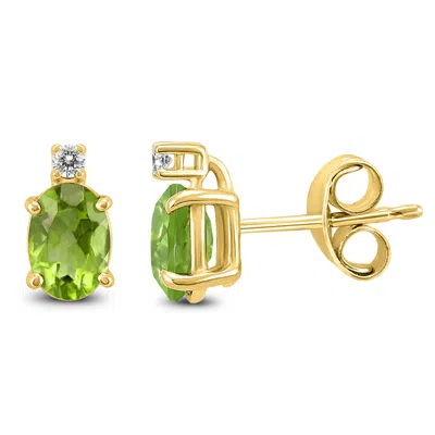 Sselects 14k 8x6mm Oval Peridot And Diamond Earrings In Green