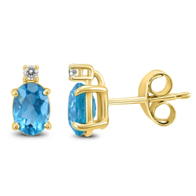 Sselects 14k 8x6mm Oval Topaz And Diamond Earrings In Blue