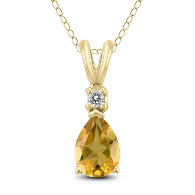 Sselects 14k 8x6mm Pear Citrine And Diamond Pendant In Gold