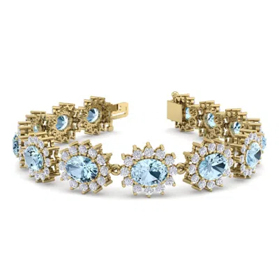 Sselects 19 Carat Oval Shape Aquamarine And Halo Diamond Bracelet In 14 Karat Yellow Gold In Blue