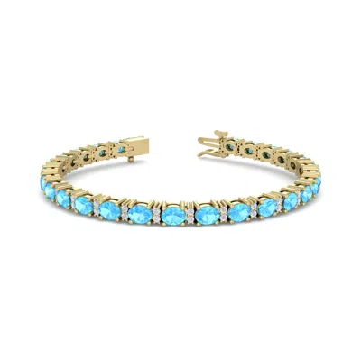 Sselects 6 Carat Oval Shape Topaz And Diamond Bracelet In 14 Karat Yellow Gold In Blue