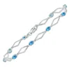 SSELECTS BLUE TOPAZ AND NATURAL DIAMOND STAR LINK BRACELET IN .925 STERLING SILVER