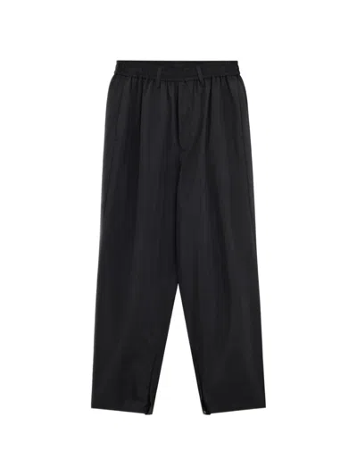 Ssstein Elasticated Zip-cuff Trousers In Black