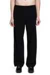 Ssstein Trousers In Black