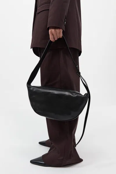 St Agni Adjustable Crescent Bag In Black