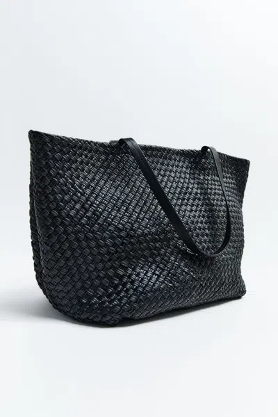 ST AGNI LARGE WOVEN TRAPEZE BAG