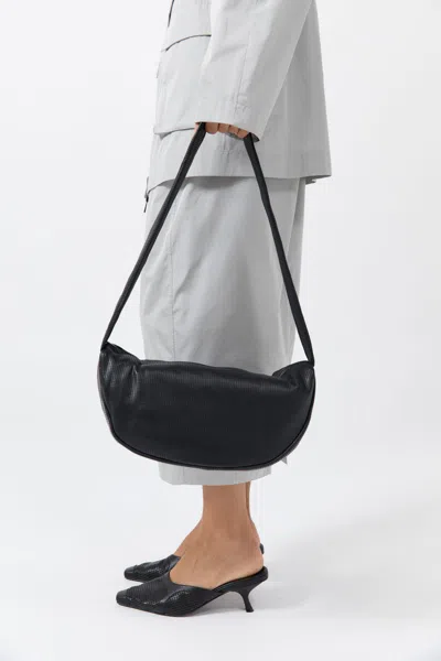 St Agni Pre-order: Perforated Crescent Bag In Black
