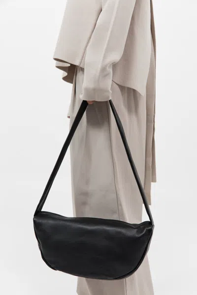 St Agni Soft Crescent Bag In Black