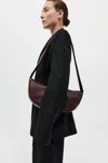 St Agni Soft Crescent Bag In Plum