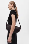 St Agni Soft Crescent Bag In Port