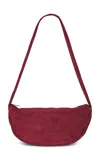 St Agni Soft Crescent Bag In Rouge