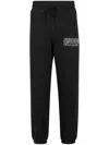 Stadium Goods Outline Logo "black" Track Pants In Black