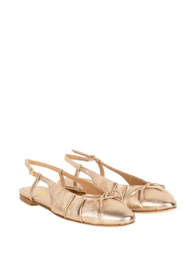 Status Bow-detail Metallic-leather Mules In Gold