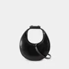 Staud Crescent-shaped Shoulder Bag In Glossy Black Leather In Black
