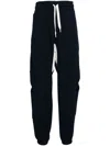 Stefan Cooke Cut-out Track Pants In Blue