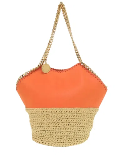 Pre-owned Stella Mccartney 2000-2025 Medium Vegan Leather And Raffia Falabella Tote Bag In Orange