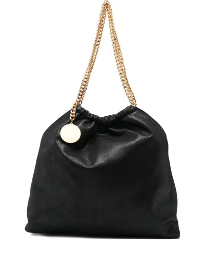 STELLA MCCARTNEY STELLA MCCARTNEY FALABELLA DRAWSTRING SHOULDER BAG IN BLACK VEGAN LEATHER