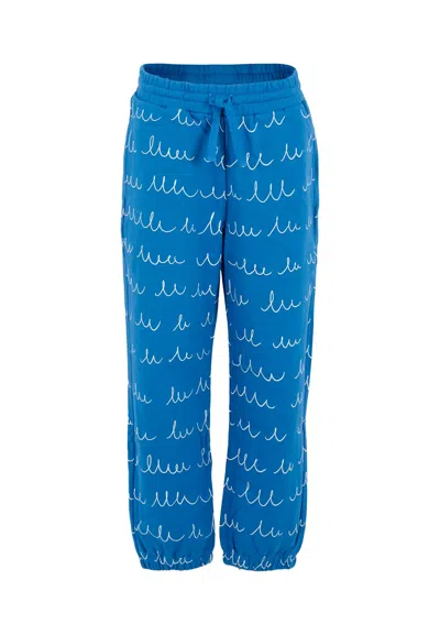 STELLA MCCARTNEY BLUE SWEATPANTS FOR BOY WITH WHITE DETAILS