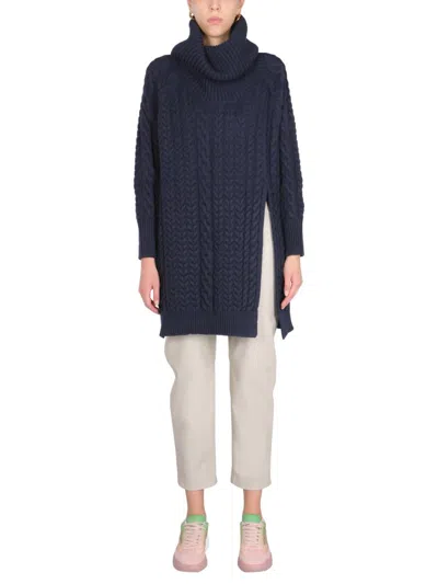 Stella Mccartney + Net Sustain Oversized Asymmetric Cable-knit Organic Cotton-blend Turtleneck Cape In Blue