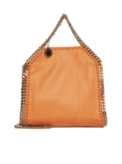 Stella Mccartney Chained Open Top Shoulder Bag In Orange