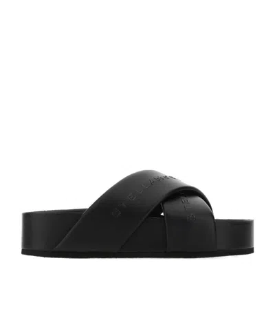 STELLA MCCARTNEY STELLA MCCARTNEY CROSS STRAP PLATFORM SANDALS