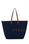 Stella Mccartney Structured Tote Bag With Denim-like Texture And Bold Lettering In Indigo