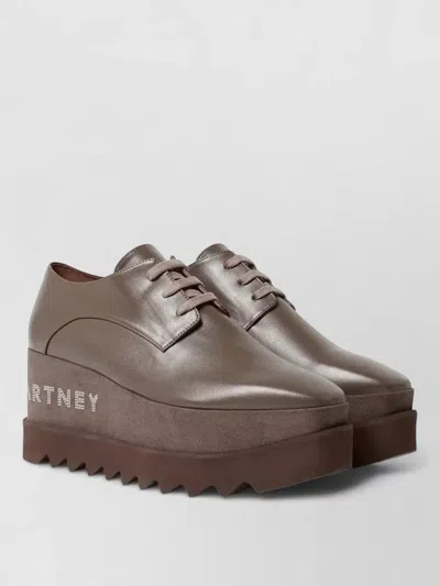 Stella Mccartney Elyse Lace Up Logo Wedge Derbies In Brown