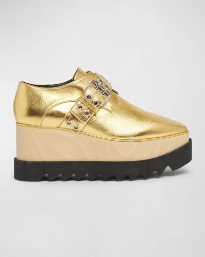 Stella Mccartney Elyse Metallic Buckle Platform Sneakers In Gold