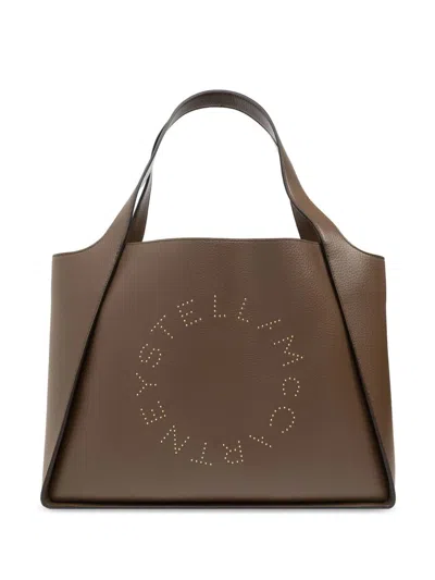 Stella Mccartney Embossed Logo Tote Bags In Brown