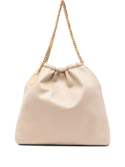 Stella Mccartney Falabella Drawstring Shoulder Bag In Beige Vegan Leather In Red
