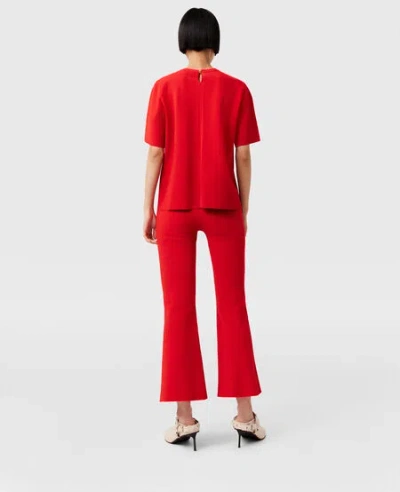 Stella Mccartney Recycled Ribbed-knit Flared Pants In Red