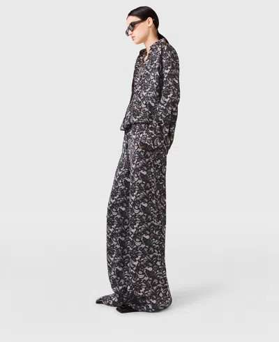 Stella Mccartney Lace Print Oversized Drawstring Trousers In Black
