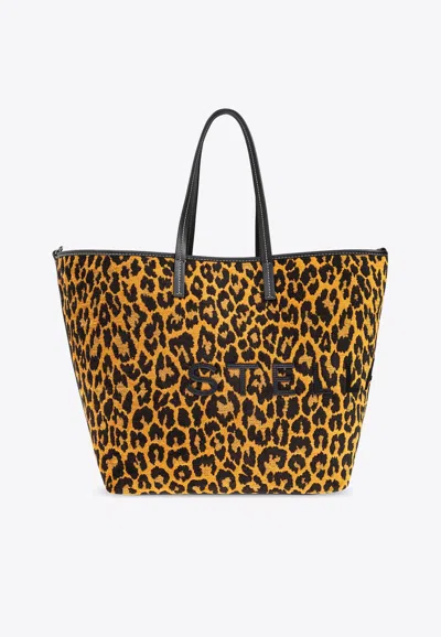 Stella Mccartney Logo-lettering Animal-print Tote Bag In Brown